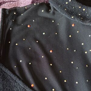 St. John Black Top with various colored Swarovski Accents. Classy classic